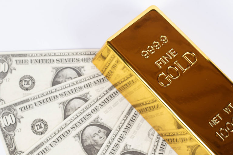 Money and gold bar